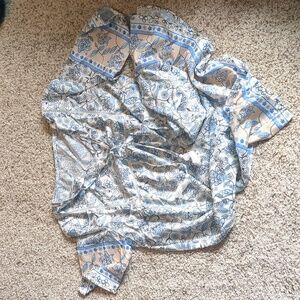 Cream dress with blue and tan flowers